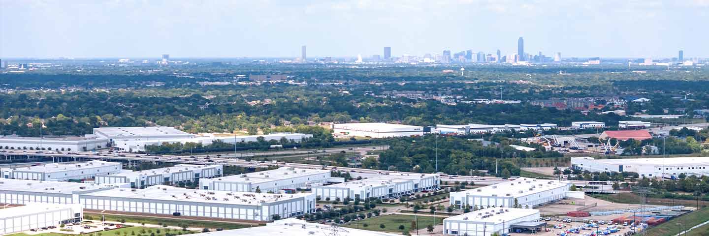 fort bend, tx industrial park and houston skyline