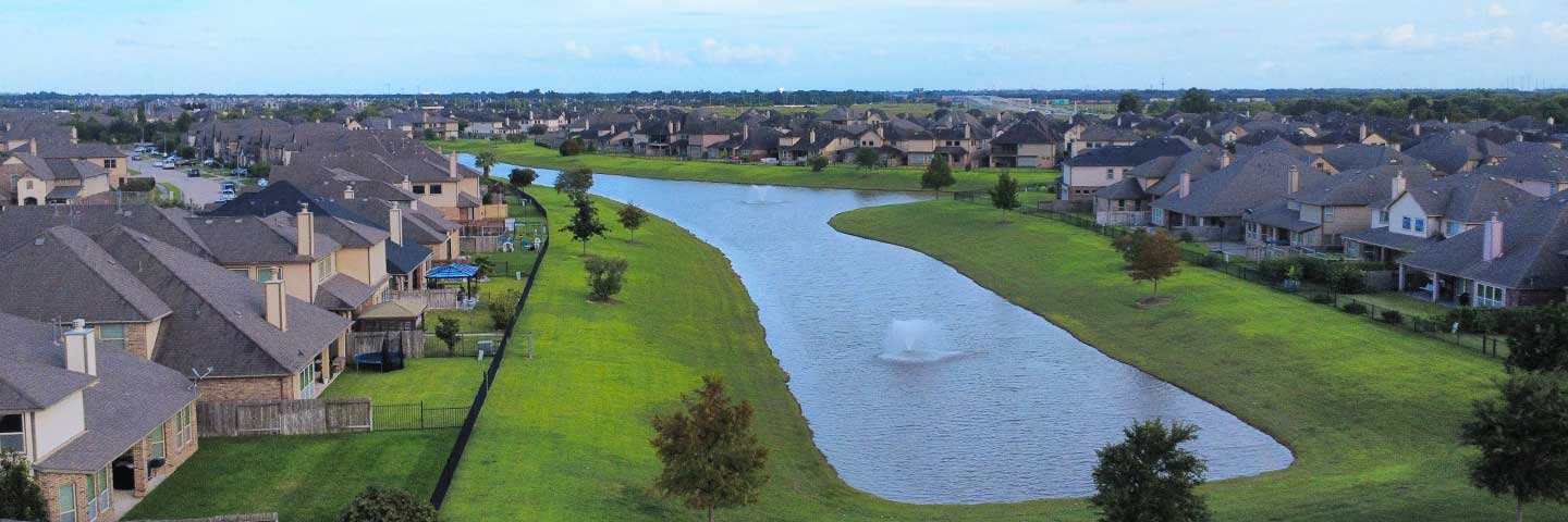 housing development around a pond in fort bend county